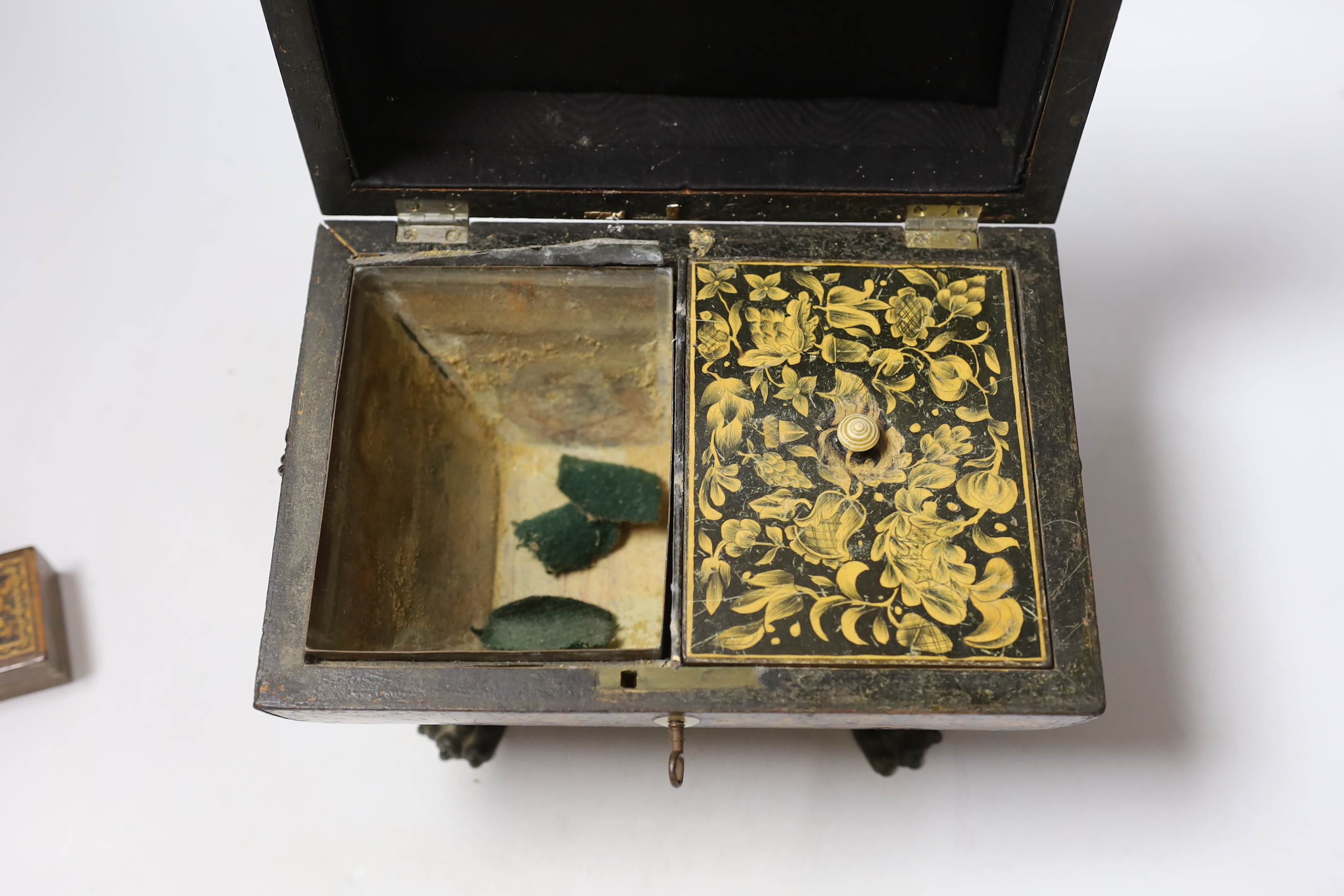 A Regency penwork tea caddy, the cover inset with an engraving of figures by a castle, 23.5 x 16 x 16cm and two small Tunbridge ware boxes